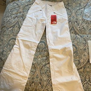 The NorthFace Womens XS Freedom white, all mountain ski pant. Never worn.